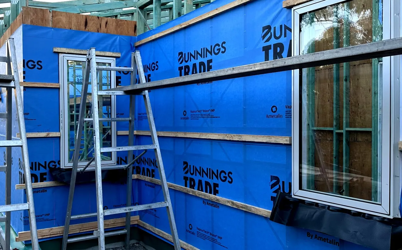 Newly installed building wrap and windows