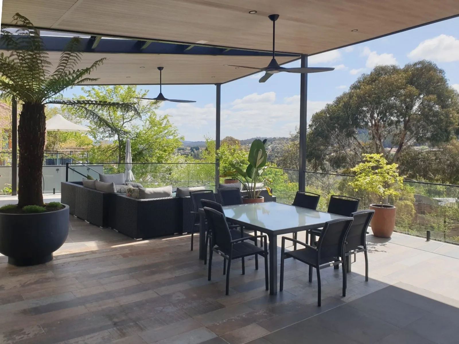 Newly completed deck with outdoor furniture and a stunning view