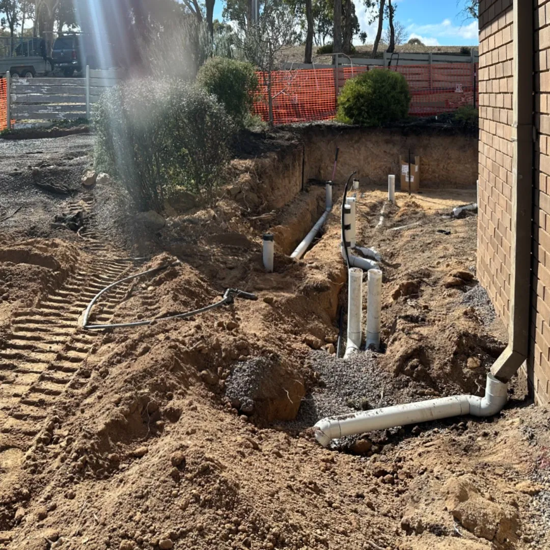Site work showing site cut and plumbing