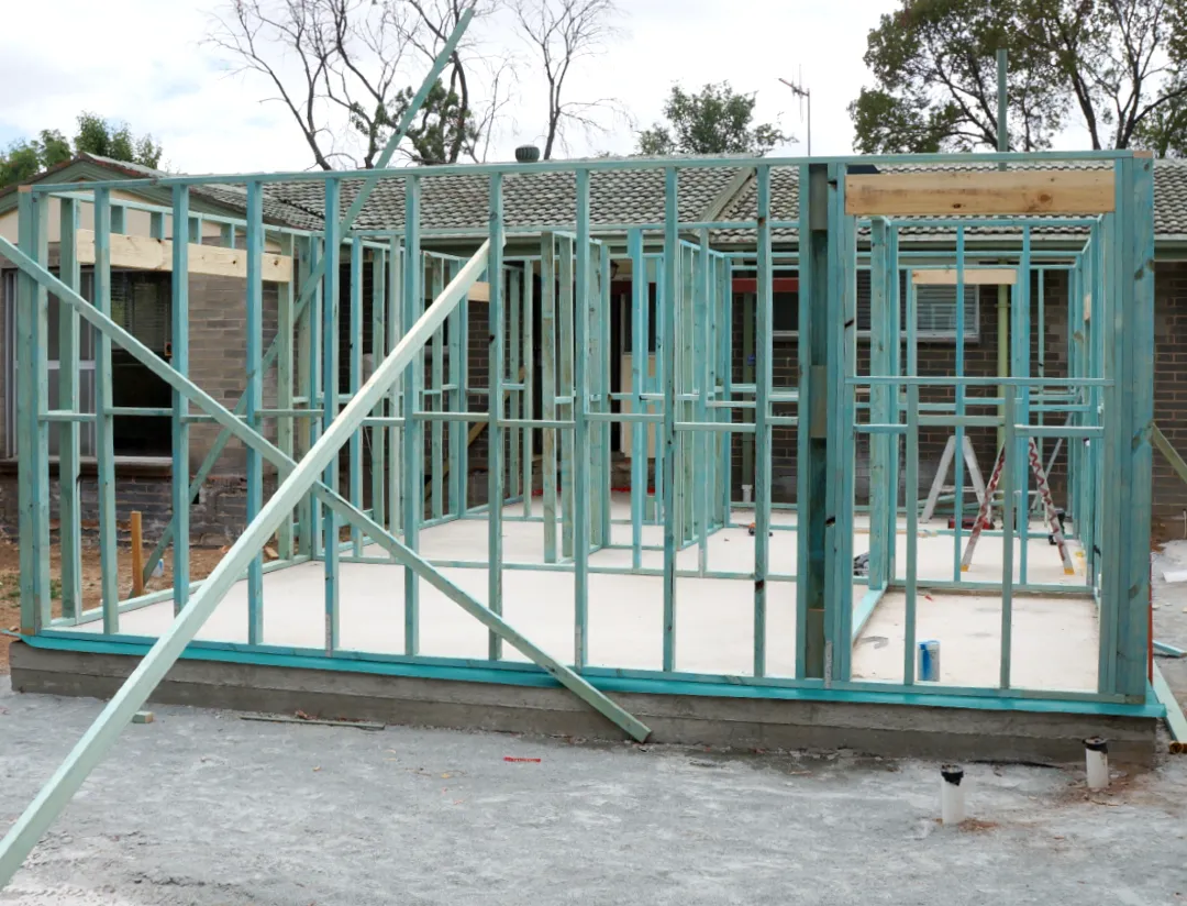 Construction site showing slab and timber framing