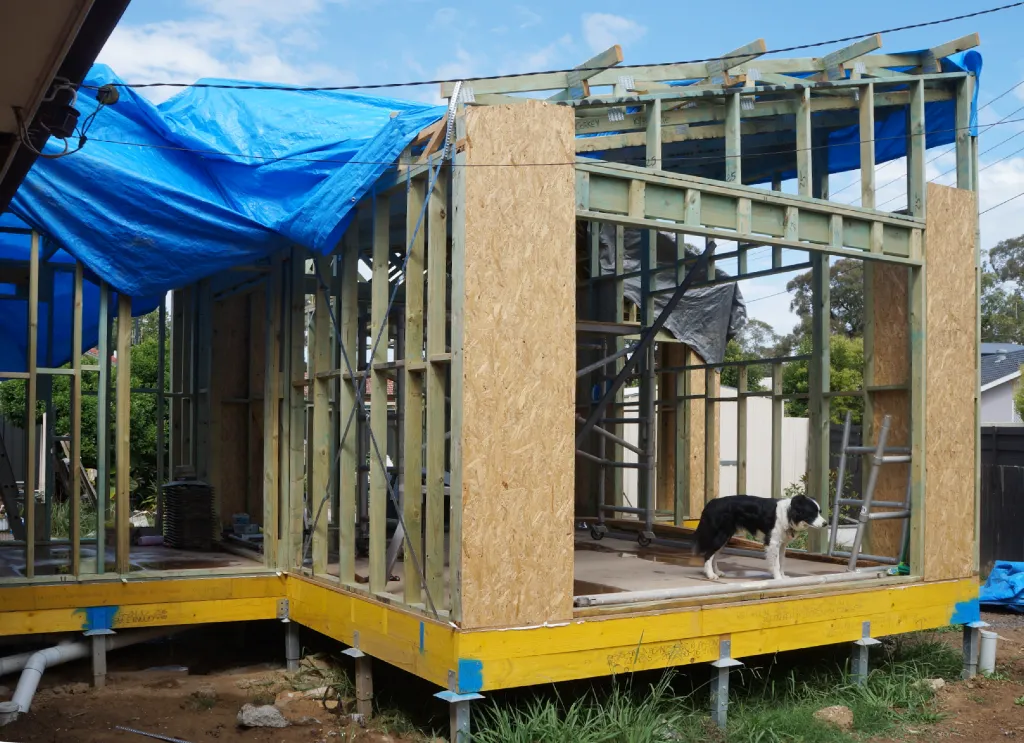 A extension under construction at the framing stage