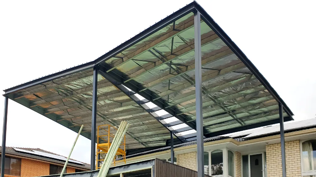 Looking up to the underside of a newly installed steel frame roof